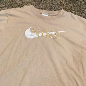 Tan Nike tee shirt